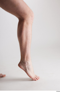 Fergal 1 calf flexing nude side view 0004.jpg